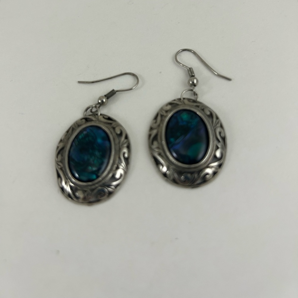 Simple dangle earrings with blueish color